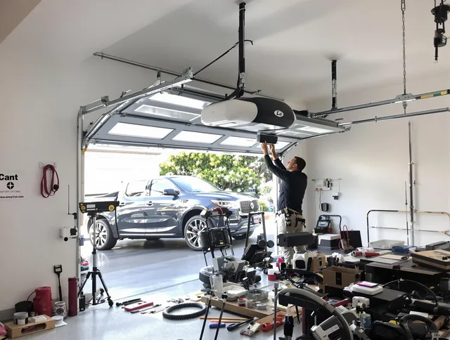 Shelton Garage Door Repair specialist installing smart garage door opener system in Shelton home