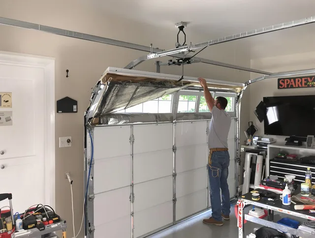 Garage door section replacement by Shelton Garage Door Repair in Shelton