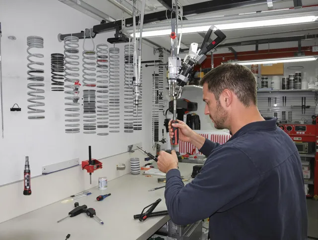 Shelton Garage Door Repair safety certified technician performing precision spring replacement in Shelton